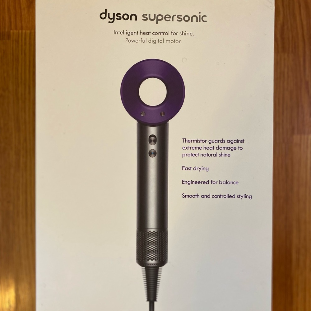 Dyson Blowdryer gently used plus a leather carrier